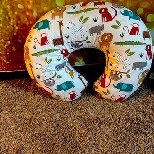 Boppy support for nursing, bottle feeding, and bonding